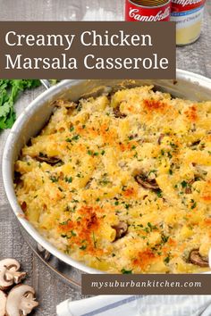 creamy chicken masala casserole with mushrooms and parsley in a white dish