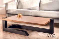 a coffee table sitting on top of a wooden floor