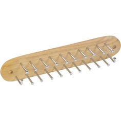 a wooden comb with metal pins on it