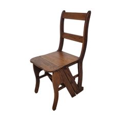 a wooden chair sitting on top of a white background