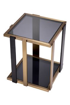 a black and gold side table with glass shelves on each side, against a white background