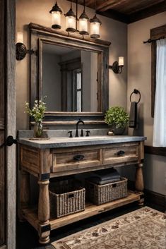 a bathroom with a large mirror, sink and wooden cabinet in the middle of it