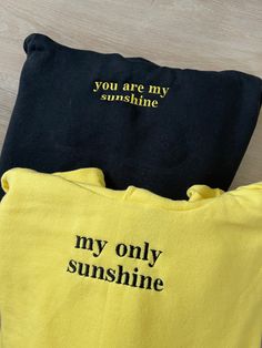 ✰COMES WITH TWO! ITEM 1: refers to "you are my sunshine" ITEM 2: refers to "my only sunshine" Photo features: Black Hoodie X Yellow Thread // Yellow Hoodie X Black Thread Navy Blue Sweatshirt x White Thread // White Sweatshirt x Dark Blue Thread ✰Embroidered Matching Sweatshirts✰UNISEX✰Hand drawn and designed✰Super soft and comfy! *Sizes 2XL-3XL may be subject to longer processing times since we don't carry a large amount of inventory in those sizes, so we would have to put in a special order fr Matching Sweatshirts For Friends, Couple Sweatshirts Diy, Making Matching Hoodies, Birthday Hoodie Ideas, You Are Sunshine, You Are My Sunshine Gifts, Matching Things With Boyfriend, Matching Hats Couples, Custom Couple Hoodies