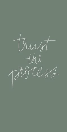 the words trust the process written in white ink on a green background with a handwritten font