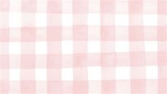 a pink and white checkered fabric with some small squares on it's side