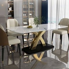 a dining room table with chairs around it