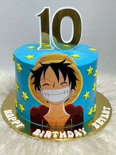 a birthday cake with the number 10 on it and an image of gohan from one piece