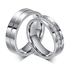 two wedding rings with diamonds on them