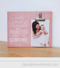 a pink photo frame with the words only the best friends get promote to godmother