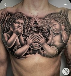 a man with tattoos on his chest and two angels covering his face in front of him