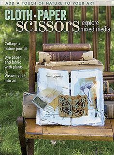 an old chair covered in books and papers