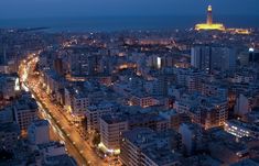 an aerial view of a city at night