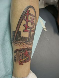 a man with a tattoo on his arm that has the st louis cardinals in it