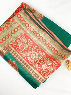 Traditional saree with blend of emeral green with red & gold border. This stunning saree includes a matching unstitched blouse piece which is customisable to fit all sizes. If you require the blouse to be stiched, We offer tailor service on request with additional cost. For more info please contact us and we will be happy to help.  🥻Occasion: Party, Sangeet, Wedding, Engagement, Outings, Mehndi, Bridal & festival. 🚚 Shipping : We offer International fast & secure shipping (Ask for more info) **Color may differ due to photography in light effect** Green Pre-draped Saree With Dupatta, Festive Green Chanderi Pre-draped Saree, Diwali Green Sharara With Cutdana Details, Traditional Drape Green Salwar Kameez With Cutdana, Traditional Green Salwar Kameez With Cutdana, Green Salwar Kameez With Cutdana In Traditional Drape, Green Art Silk Sharara With Cutdana, Green Dola Silk Pre-draped Saree With Dupatta, Green Dola Silk Pre-draped Saree For Diwali