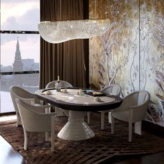 a dining room table with chairs around it and a chandelier hanging from the ceiling