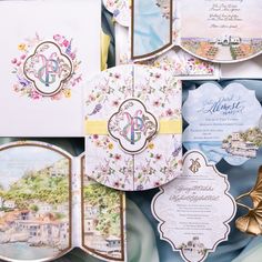 the wedding stationery is laid out on top of each other