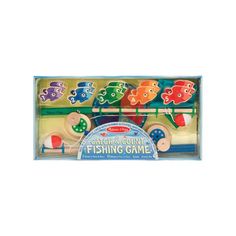 an assortment of wooden fishing games in a box