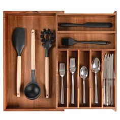 an open drawer with utensils and spoons in it