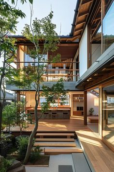 an outside view of a house with trees and stairs