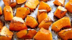 roasted sweet potatoes on a baking sheet ready to be cooked