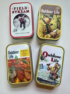 four tins with different types of outdoor life on them