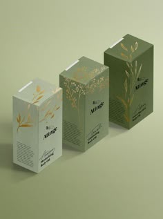 three boxes that are designed to look like tea bags with gold foiling on them