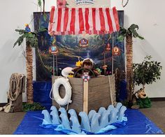 an inflatable pirate ship with life preservers and decorations on the front wall