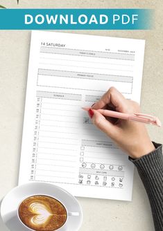 a person writing on a paper with a cup of coffee next to it