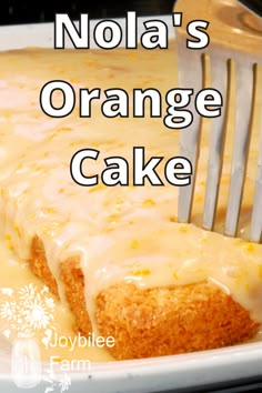 an orange cake is being eaten with a fork