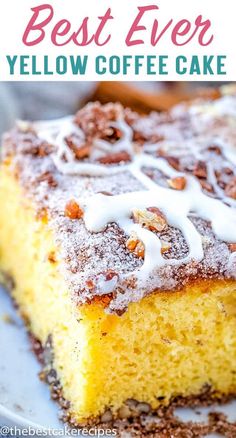 the best ever yellow coffee cake with white icing on top is sitting on a plate