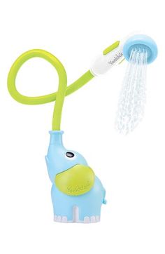 an elephant shaped water spouter attached to a shower head with a green handle