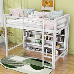 a white bunk bed sitting on top of a wooden floor next to a book shelf