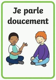 a sign that says je parle doucement with two children sitting on the ground