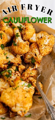 cauliflower with parsley on top in a brown paper bag next to a fork