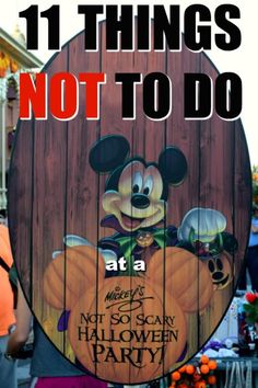 there is a sign that says 11 things not to do at a mickey mouse halloween party