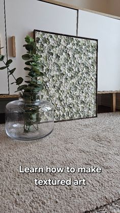 a vase filled with flowers sitting on top of a carpeted floor next to a mirror