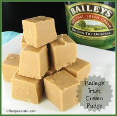 bailey's irish cream fudge on a white plate next to a bottle of beer