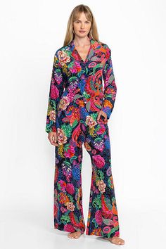 Crafted from 100% luxurious silk, the Jaclyn Long Set Pajamas are adorned with vibrant floral color. Featuring a button-down long sleeve top and wide-leg pants with an easy elastic waist, these sumptuous pajamas are finished with pockets at the side seams. Pair with the Cozy Robe and coordinating slippers for a relaxing night in. Johnny Was Women's Jaclyn Long Pajama Set in Emberwing Pink, Size XS, Silk, Floral Multicolor Silk Sets With Vibrant Print, Multicolor Long Sleeve Silk Sets, Multicolor Silk Long Sleeve Sets, Silk Floral Print Long Sleeve Sets, Designer Multicolor Silk Sets, Luxury Silk Long Sleeve Sets, Luxury Long Sleeve Silk Set, Multicolor Floral Print Silk Set, Silk Multicolor Floral Print Set