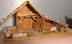 a model of a house made out of wood