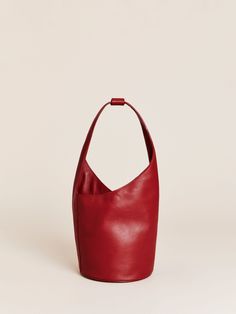 Extra baggage. Shop the Small Silvana Bucket Bag, a sustainable bag from Reformation. Lip Balm Collection, Sustainable Bag, Double Barrel, Barrel Bag, Friends With Benefits, Black Friday Sale, Egift Card, New Bag, Leather Working