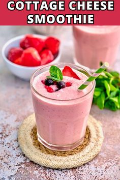 strawberry cheese smoothie in a glass with strawberries on the side and text overlay that reads cottage cheese smoothie