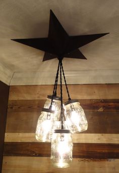 mason jar chandelier hanging from the ceiling with free shipping on orders for $ 10