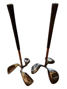 two different types of golf clubs on a white background