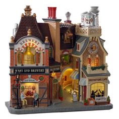 a toy store with people standing outside and on the front porch in front of it