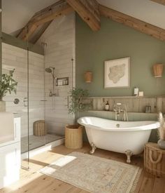 a bathroom with a bathtub, rug and wooden floors