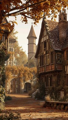 an old house with a clock tower in the background and autumn foliage on the ground