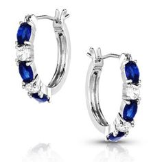 The stunning sapphire stones in the Endless Montana Blue Crystal Hoop Earrings remind us of the beauty of Montana. The stunning silver tone earrings are a hoop secured by a hypoallergenic hinged clasp. At the front of the hoop are sparkling sapphire crystals and between each are clear cubic zirconia crystals that catch the eye and elevate the design for a timeless and classic look. Montana armor protective coating Sapphire Stones, Crystal Hoop Earrings, Tractor Supply, Sapphire Stone, Accessories Jewelry Earrings, Blue Crystals, Women Accessories Jewelry, Classic Looks, Tractor