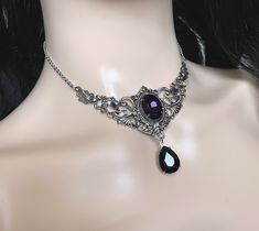 "Choker: This elegantly ornate necklace is made with antique silver tone centerpieces, featuring lavish baroque details. Its mesmerizing design is accented with dazzling deep violet purple glass crystals/jewels. Decorated portion is 4\" wide and 2 1/2\" tall in the very center. Necklace length is adjustable 14\"-17\" with soldered stainless steel cable chain, lobster clasp and extender. If you would like a different length, please send us a message. Earrings: These dainty and elegantly ornate ea Baroque Details, Gothic Antique, Ornate Necklace, Purple Queen, Purple Gothic, Dark Amethyst, Victorian Wedding, Choker Pendant, Stainless Steel Cable