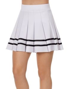 a woman wearing a white tennis skirt with black stripes