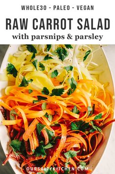 a white bowl filled with sliced carrots and parsley on top of a marble counter